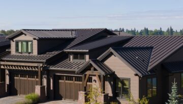 Metal roof on a brown twin home.