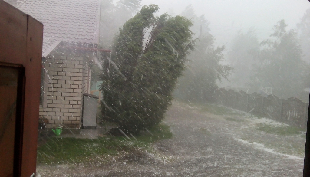 A heavy rain storm in a residential zone.