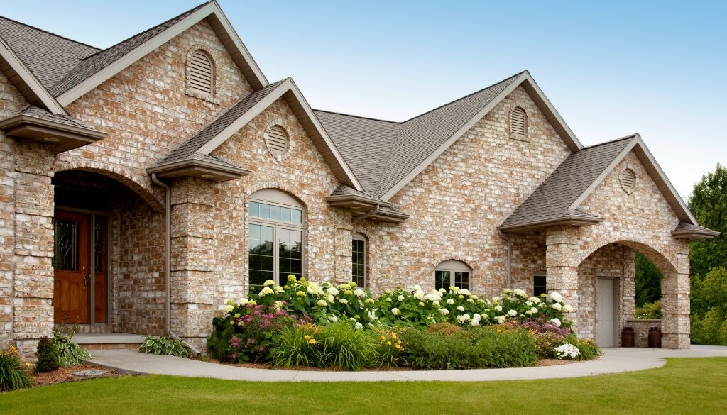 A new roof on a brick residential home.