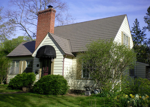 A residential home with a red brick chimney in La Crosse, Wisconsin.