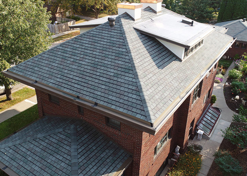 A nicely maintained residential home exterior by Ledegar Roofing.