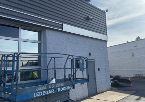 Ledegar Roofing lift in front of Dahl Automotive in La Crosse, WI. 