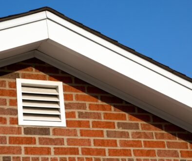 The outside of a properly ventilated attic on a brick house