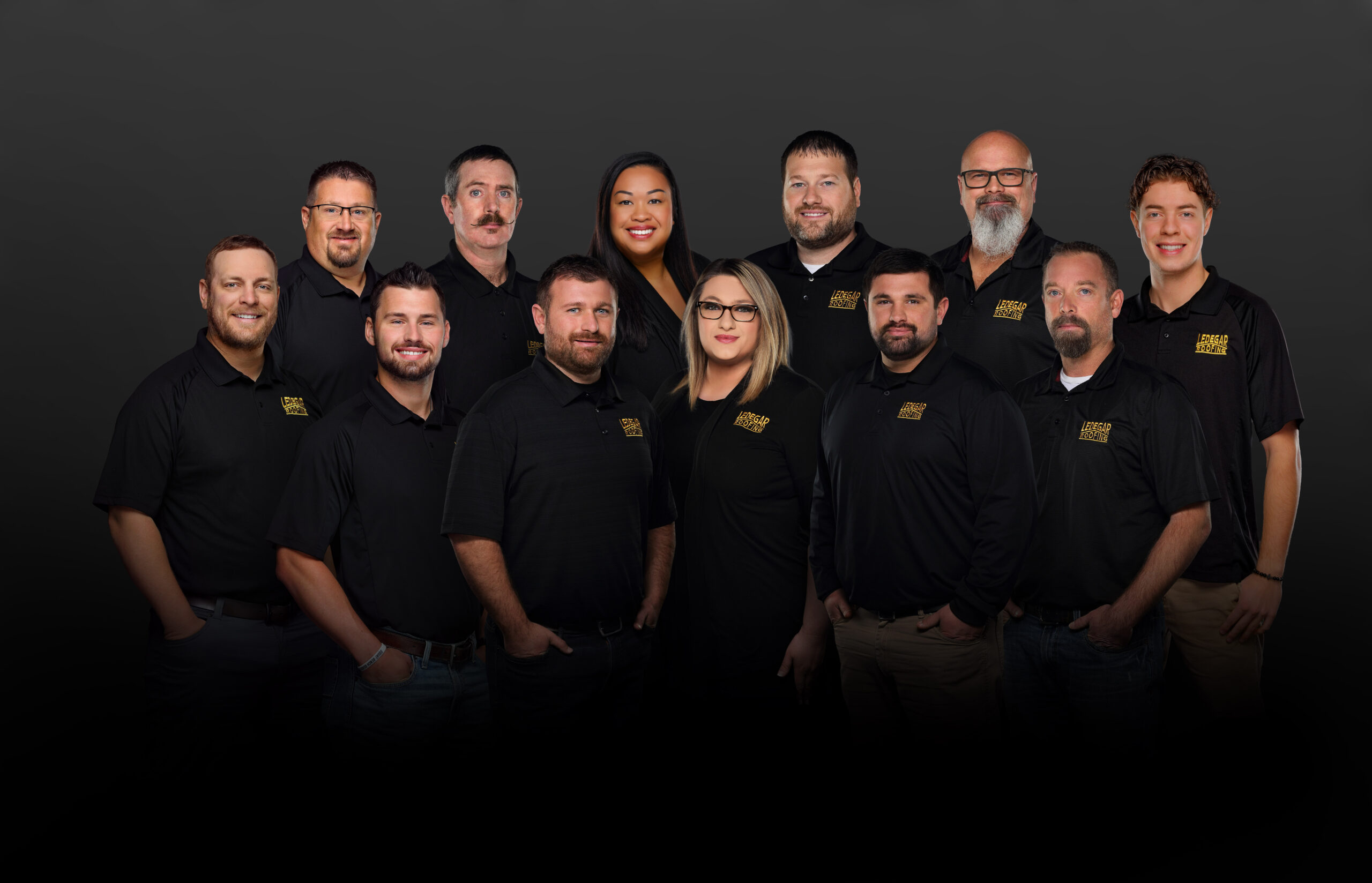 Group photo of Ledegar Roofing's employees.
