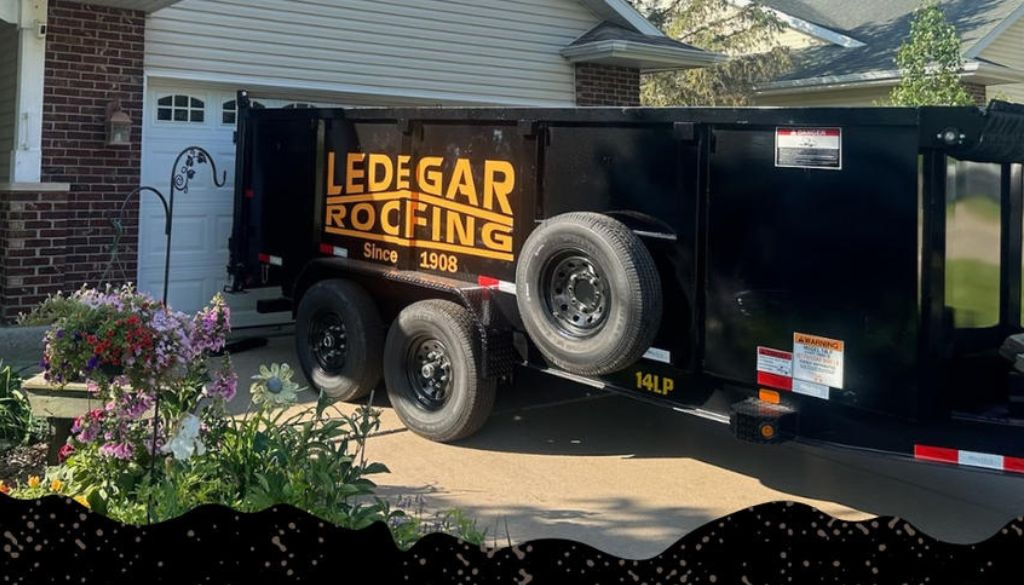 Ledegar Roofing trailer parked in a driveway