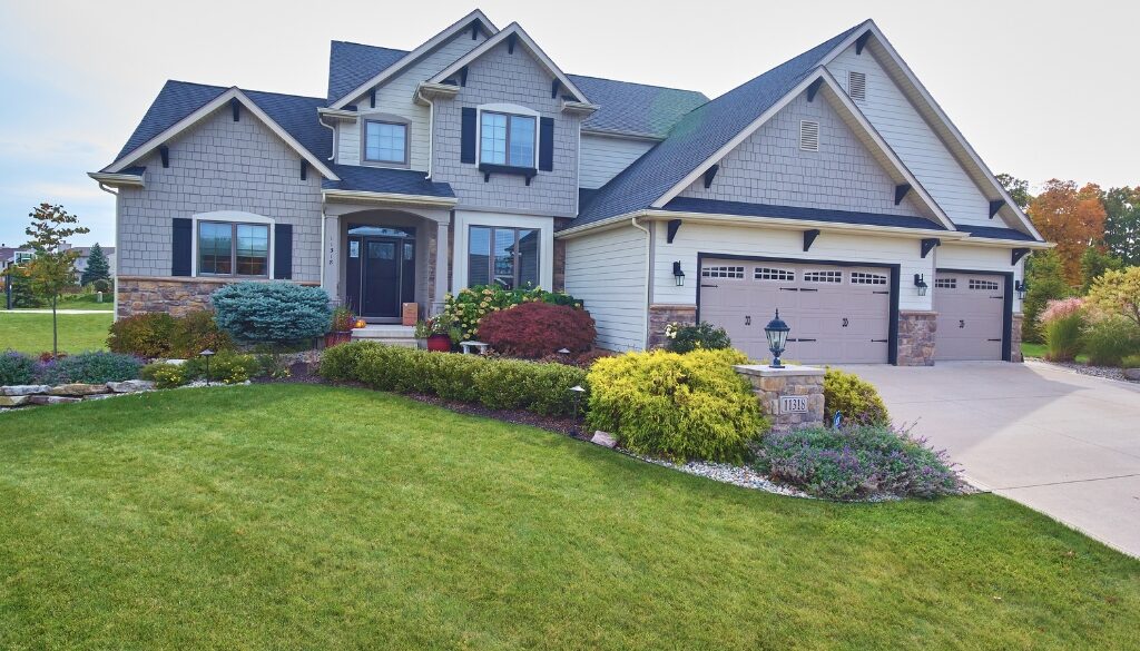 A residential home with a recent siding renovation. Siding includes Hardie Board and Vinyl siding.