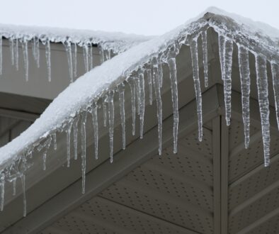 Icicles hanging off a residential home's roof