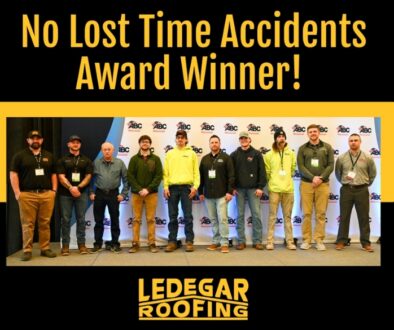 A group of Ledegar Roofing team members standing together at an award ceremony, celebrating their recognition as a "No Lost Time Accidents" award winner. The image features a bold black and yellow design with the Ledegar Roofing logo and ABC event branding in the background.