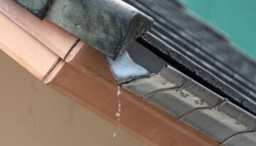 ledegar-roofing-gutters-after-spring-rain-repair-shingles