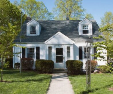 Exterior shot of a house with maintained home components to maximize their lifespan.