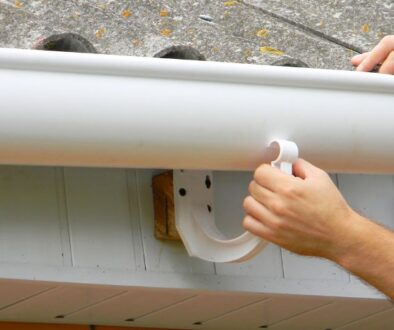 Improvements are made to a house's gutters as a part of a roofing, siding, and gutter plan.